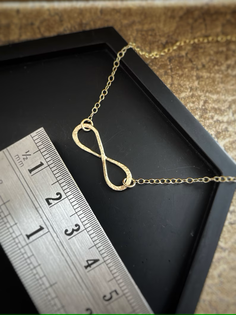 Solid 9ct solid gold interlocking, a handmade hammered textured infinity necklace