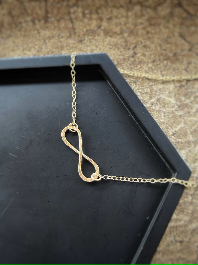 Solid 9ct solid gold interlocking, a handmade hammered textured infinity necklace