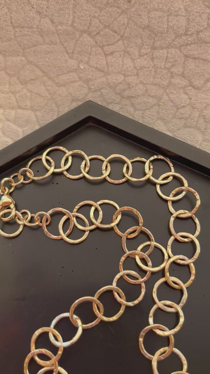 Solid 9ct recycled yellow gold, a hammered handmade hoop interlocking hoop tree bark texture necklace